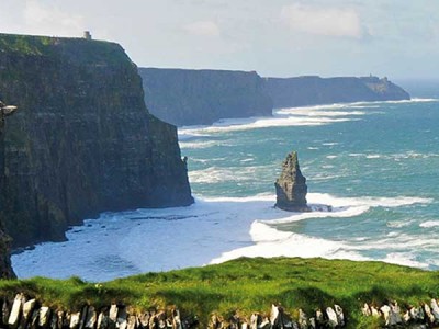 Ireland's most visited tourist attraction, the spectacular Cliffs of Moher loom majestically over the Atlantic Ocean on the edge of Western Europe.